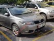 Kia Forte   MT  2010 - Bán Kia Forte MT đời 2010, màu nâu  