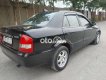 Mazda 323 2004 - Cần bán lại xe Mazda 323 sản xuất năm 2004, màu đen, giá 150tr