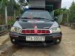 Kia Spectra 2004 - Cần bán gấp Kia Spectra đời 2004, màu đen, 85tr