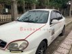 Daewoo Lanos 2001 - Cần bán Daewoo Lanos sản xuất 2001, màu trắng