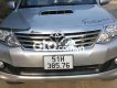 Toyota Fortuner G 2014 - Cần bán Toyota Fortuner G sản xuất 2014, màu bạc số sàn