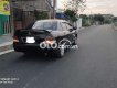 Mitsubishi Lancer 2003 - Cần bán xe Mitsubishi Lancer sản xuất năm 2003, màu đen còn mới giá cạnh tranh