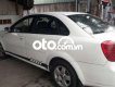 Daewoo Lacetti   EX  2005 - Cần bán Daewoo Lacetti EX đời 2005, màu trắng, xe nhập