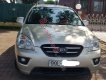 Kia Carens   2010 - Cần bán Kia Carens sản xuất năm 2010, màu ghi vàng