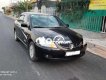 Mitsubishi Lancer 2003 - Cần bán xe Mitsubishi Lancer sản xuất năm 2003, màu đen còn mới giá cạnh tranh