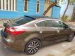 Kia K3   1.6AT  2015 - Cần bán Kia K3 1.6AT sản xuất 2015, màu nâu, 452 triệu
