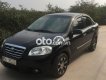 Daewoo Gentra MT 2009 - Bán ô tô Daewoo Gentra MT đời 2009, màu đen, giá 135tr