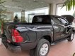 Toyota Hilux E 2019 - Cần bán gấp Toyota Hilux E đăng ký 2019 chính chủ giá 618tr