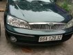 Ford Laser 2002 - Ford Laser 1.8MT bản đủ, 4 thắng đĩa ABS, vô lăng 4 chấu túi khí, xe công viên chức