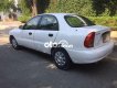 Daewoo Lanos 2004 - Cần bán xe Daewoo Lanos đời 2004, màu trắng