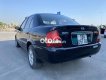 Mazda 323 2004 - Bán xe Mazda 323 đời 2004, màu đen xe gia đình