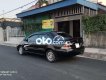 Mitsubishi Lancer 2004 - Cần bán lại xe Mitsubishi Lancer đời 2004, màu đen còn mới