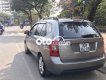 Kia Carens 2009 - Cần bán Kia Carens 2.0 MT đời 2009, màu xám còn mới