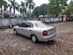 Daewoo Nubira 2002 - Cần bán gấp Daewoo Nubira đời 2002, màu bạc