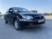 Mazda 323 2004 - Bán xe Mazda 323 đời 2004, màu đen xe gia đình