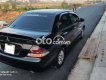 Mitsubishi Lancer 2004 - Cần bán lại xe Mitsubishi Lancer đời 2004, màu đen còn mới