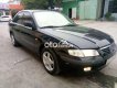 Mazda 626 MT 2001 - Bán Mazda 626 MT đời 2001, màu đen, nhập khẩu nguyên chiếc, giá chỉ 125 triệu