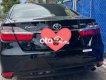 Toyota Camry 2.0E 2015 - Cần bán lại xe Toyota Camry 2.0E năm sản xuất 2015, màu đen