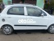 Chevrolet Spark MT 2009 - Cần bán gấp Chevrolet Spark MT sản xuất 2009, màu trắng còn mới giá cạnh tranh