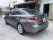 Kia Forte  MT 2010 - Cần bán gấp Kia Forte MT đời 2010, màu xám, nhập khẩu nguyên chiếc chính chủ