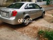 Daewoo Lacetti  MT 2010 - Bán ô tô Daewoo Lacetti MT năm 2010, màu bạc 