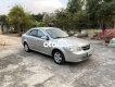 Chevrolet Lacetti MT 2011 - Cần bán xe Chevrolet Lacetti MT năm 2011, màu bạc