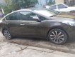 Kia K3 2014 - Cần bán lại xe Kia K3 2.0 AT sản xuất năm 2014, màu nâu
