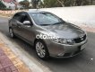 Kia Cerato AT 2009 - Cần bán lại xe Kia Cerato AT 2009, màu xám 