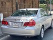 Toyota Camry   2.4G  MT 2004 - Bán xe Toyota Camry 2.4G  MT năm 2004, màu bạc giá cạnh tranh