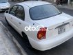 Daewoo Lanos MT 2003 - Cần bán Daewoo Lanos MT đời 2003, màu trắng, nhập khẩu nguyên chiếc chính chủ