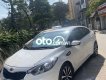 Kia K3 AT 2016 - Cần bán gấp Kia K3 AT sản xuất năm 2016, màu trắng