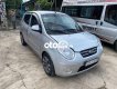 Kia Morning MT 2009 - Cần bán Kia Morning MT năm sản xuất 2009, màu bạc xe gia đình, giá 130tr