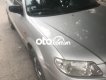 Mazda 323 2003 - Bán Mazda 323 năm sản xuất 2003, màu bạc