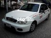 Daewoo Lanos 2003 - Cần bán gấp Daewoo Lanos MT sản xuất năm 2003, màu trắng, nhập khẩu