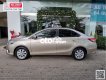 Toyota Vios  1.5E  2016 - Cần bán lại xe Toyota Vios 1.5E sản xuất 2016, màu vàng