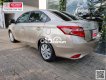 Toyota Vios  1.5E  2016 - Cần bán lại xe Toyota Vios 1.5E sản xuất 2016, màu vàng