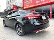 Kia Cerato 1.6AT 2018 - Cần bán lại xe Kia Cerato 1.6AT năm 2018, màu đen giá cạnh tranh