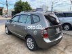 Kia Carens MT 2011 - Bán Kia Carens MT sản xuất 2011, màu xám xe gia đình