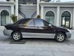 Mitsubishi Lancer 1.6 2003 - Cần bán Mitsubishi Lancer 1.6 sản xuất năm 2003, màu nâu giá cạnh tranh