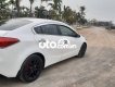 Kia K3  MT 2016 - Cần bán xe Kia K3 MT năm 2016, màu trắng xe gia đình