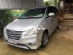 Toyota Innova 2.0E MT 2014 - Cần bán lại xe Toyota Innova 2.0E MT sản xuất năm 2014, màu bạc