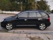 Kia Carens   2.0 AT 2009 - Cần bán gấp Kia Carens 2.0 AT năm sản xuất 2009, màu đen