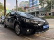 Toyota Corolla altis 2017 - Bán gấp Toyota Corolla Altis 1.8G AT năm 2017, màu đen, còn nguyên dàn lốp, xe rất mới, giá tốt