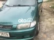 Mazda 323 1.6 MT 1999 - Bán Mazda 323 1.6 MT sản xuất 1999, màu xanh giá chỉ 62 triệu