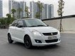 Suzuki Swift 2015 - Cần bán lại xe Suzuki Swift 1.4AT sản xuất 2015, màu trắng, giá tốt