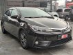 Toyota Corolla 1.8G AT  2019 - Cần bán xe Toyota Corolla Altis 1.8G AT sản xuất 2019, màu nâu chính chủ