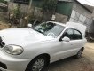 Daewoo Lanos 2002 - Cần bán gấp Daewoo Lanos sản xuất năm 2002, màu trắng, xe nhập