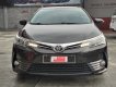 Toyota Corolla 1.8G AT  2019 - Cần bán xe Toyota Corolla Altis 1.8G AT sản xuất 2019, màu nâu chính chủ