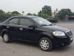 Daewoo Gentra 1.5MT 2010 - Cần bán Daewoo Gentra 1.5MT năm sản xuất 2010, màu đen xe gia đình