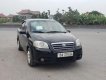 Daewoo Gentra 1.5MT 2010 - Cần bán Daewoo Gentra 1.5MT năm sản xuất 2010, màu đen xe gia đình